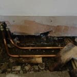 Underfloor central heating pipes