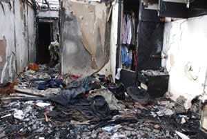 Fire Damage Insurance Claim Case Study - Bedroom damaged by fire