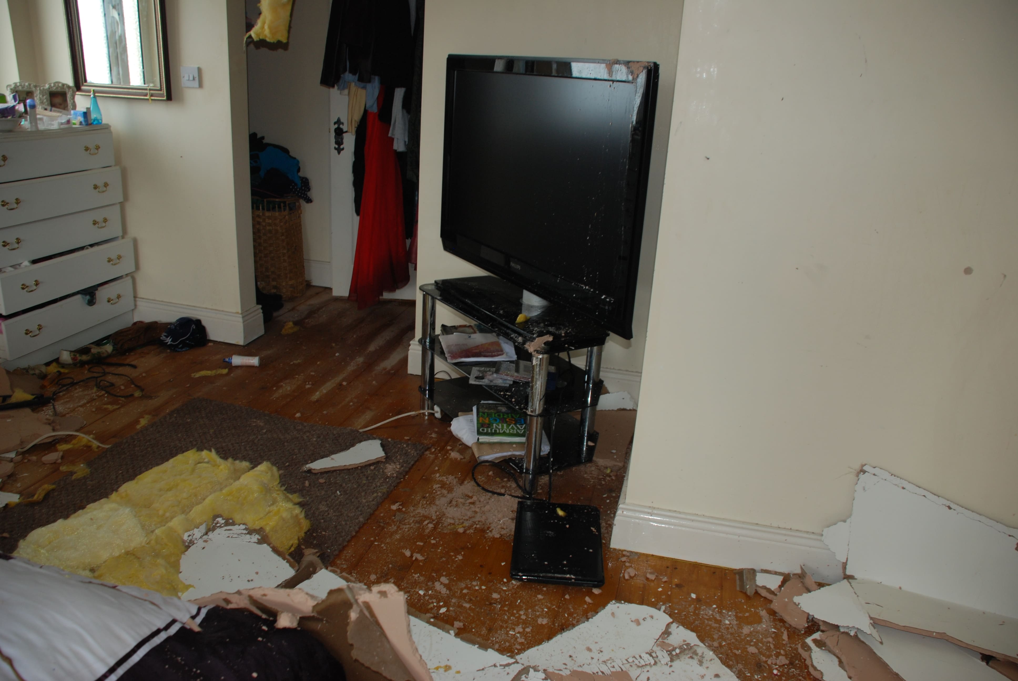 Attic Tank Leak - Burst tank in attic causes major damage 2 Bedroom floor after attic tank leak