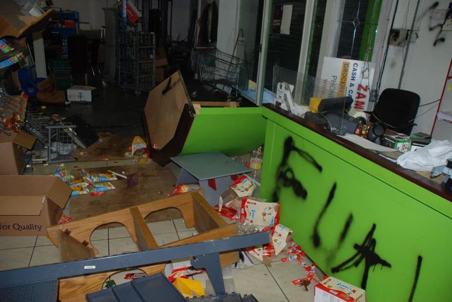 Malicious damage to property - vandalised store