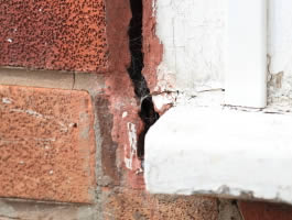 Subsidence crack between window and wall