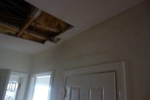 Water pipe leak damaging ceilings