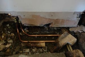 Underfloor central heating pipes