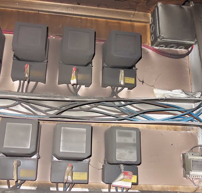 Fire Damage Claim - charred electric meters damaged by smoke and fire